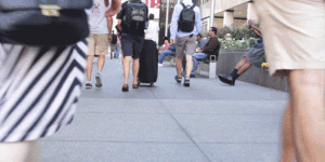 bad websites, gif of people walking down the street in new york, missing free customers with a bad website, customers are walking by you when you have a bad website